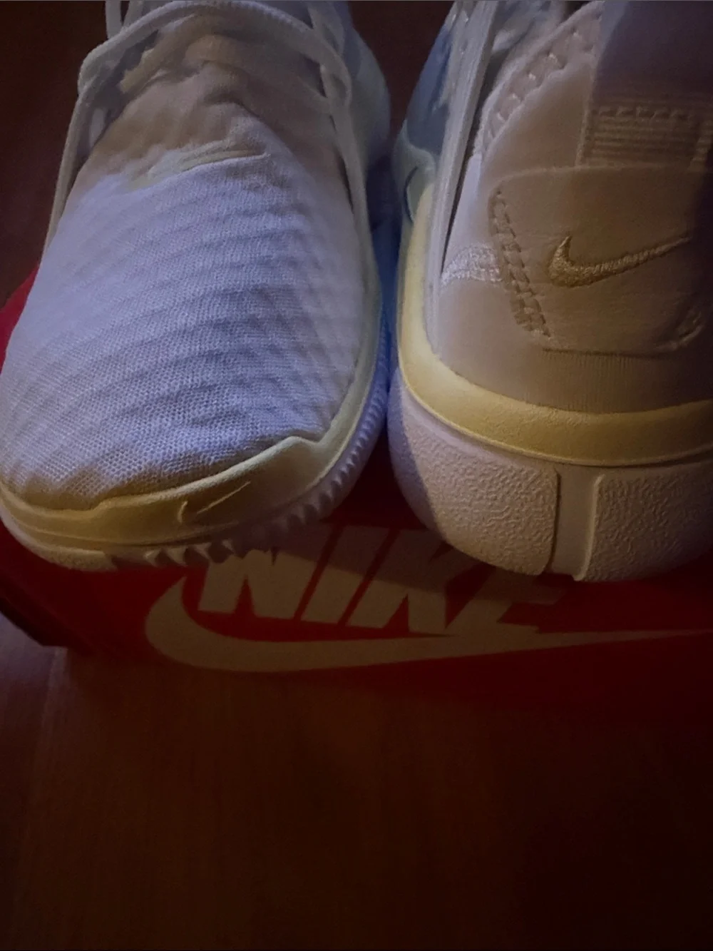 Nike White Athletic Sneakers with Blue Swoosh and Cream Trim
